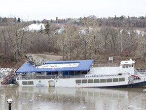 The Edmonton Riverboat appears stuck on the bank of the North Saskatchewan River in downtown Edmonton on Wednesday, April 22, 2020.