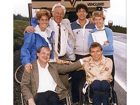Back, from left: Amanda Reid, Jim Cochrane, Don Alder, and Nancy Thompson. Front: Cam Tait, left, and Rick Hansen in 1986 outside Clarenville, N.L.