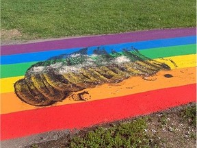 The Aridrie Pride Society was disturbed to find that the city's Pride walkway had been tarred and feathered on the morning of Saturday, June 27, 2020. The group said it would cost $300 to repaint.