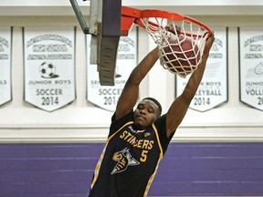 Kenny Otieno competes in a slam-dunk competition at Archbishop MacDonald High School in Edmonton on May 3, 2019. Otieno, 28, a former member of the University of Alberta Golden Bears men’s basketball team and Edmonton Stingers of the Canadian Elite Basketball League, had his own interaction with police and documented the encounter on his Facebook page earlier this week in the wake of the George Floyd protests.