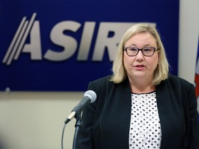 ASIRT Executive director Susan Hughson updates media after finishing the investigation into the March 2018 incident where a police officer was shot and the suspect ultimately committed suicide in a burning northeast garage. The briefing took place in the Calgary on Wednesday August 21, 2019. Gavin Young/Postmedia