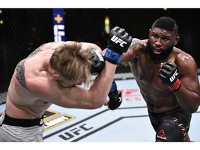Curtis Blaydes punches Alexander Volkov of Russia in their heavyweight bout during UFC Fight Night at UFC APEX in Las Vegas on Saturday, June 20, 2020. Chris Unger/Zuffa LLC via USA TODAY Sports