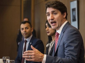 Prime Minister Justin Trudeau, alongside Liberal MPs (from left) Marwan Tabbara and Bardish Chagger meet with Region of Waterloo mayors and delivers brief opening remarks in Kitchener, Ont., on Wednesday, April 17, 2019.