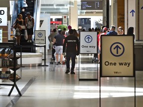 One way is the only way as COVID-19 social distancing measures/signs at West Edmonton Mall are very noticeable to aid in reopening in Edmonton, June 22, 2020.