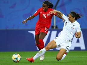 Canada's Nichelle Prince, left, in action against New Zealand at the FIFA Women's World Cup at the Stade des Alpes, in Grenoble, France on June 15, 2019.