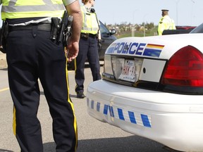 RCMP and Alberta Sheriffs run a vehicle check stop on Hwy #21 south of Baseline Rd., in Sherwood Park May 17, 2012.