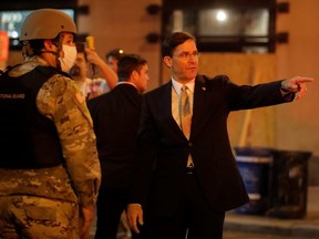 U.S. Defence Secretary Mark Esper visits National Guard officers guarding the White House amid nationwide unrest following the death in Minneapolis police custody of George Floyd, in Washington, June 1, 2020.