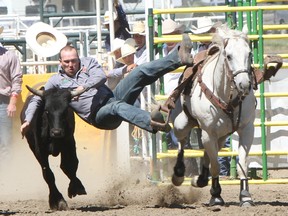 Chance Butterfield competes in the steer wrestling event at the Strathmore Stampede in this file photo from 2013.