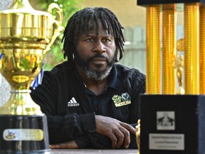 Owen Dawkins, pictured at his home in Edmonton, June 18, 2020, is the head coach of the University of Alberta Golden Bears and Pandas, one of the school's few athletic programs that will continue next season.