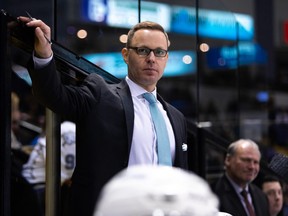 Victoria Royals coach Dan Price looks on from the bench against the Vancouver Giants in WHL play on Jan. 18, 2020.