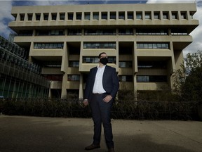 Lawyer Ken Proudman wears a mask outside the Edmonton law courts building on May 15, 2020. Alberta courts began mandating face masks July 6.