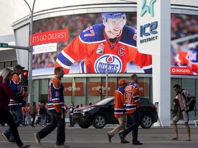 Oilers fans arrive at Rogers Place prior to the Edmonton Oilers and San Jose Sharks NHL playoff, in Edmonton Thursday April 20, 2017.