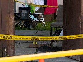 Edmonton Police Service officers are investigating a suspicious death at 1687 42 Street NW in Edmonton, on Monday, July 27, 2020. Photo by Ian Kucerak/Postmedia