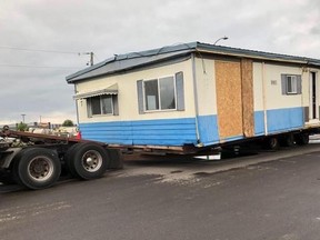 Sheriff Highway Patrol received multiple complaints regarding a semi hauling a double-wide mobile home travelling north on Highway 2.  Officers found several violations, including: - neither driver had an operator's licence with them  - none of the vehicles had insurance  - all the vehicles were missing licence plates  - the semi had expired registration Officers laid a total of 40 charges during the investigation.