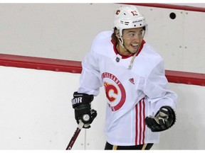 Calgary Flames forward Johnny Gaudreau smiles as he takes part in the teamÕs first practice since the COVID-19 shutdown at the Scotiabank Saddledome in Calgary on Monday, July 13, 2020. Gavin Young/Postmedia