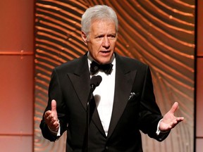 Jeopardy host Alex Trebek speaks on stage during the 40th annual Daytime Emmy Awards in Beverly Hills, Calif., June 16, 2013.