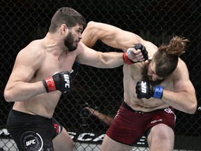 Tanner Boser, left, takes on Philipe Lins of Brazil  during UFC Fight Night at the UFC APEX on June 27, 2020.