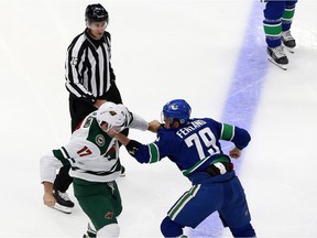 Micheal Ferland took on Marcus Foligno in a first-period fight Sunday in Edmonton.