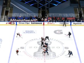 The Calgary Flames and the Winnipeg Jets face off to start the third period in Game 3 of the Western Conference Qualification Round at Rogers Place on August 04, 2020.