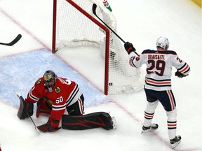 Leon Draisaitl #29 of the Edmonton Oilers scores a goal past Corey Crawford #50 of the Chicago Blackhawks during the first period in Game 3 of the Western Conference Qualification Round at Rogers Place on August 05, 2020.