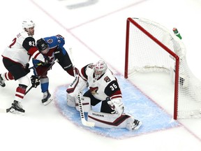 Goaltender Darcy Kuemper of the Arizona Coyotes makes a save against the Colorado Avalanche during the first period in Game 1 of the Western Conference First Round during the 2020 NHL Stanley Cup Playoffs at Rogers Place on August 12, 2020.