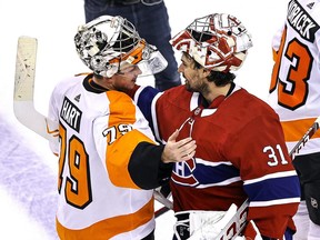 Carter Hart #79 of the Philadelphia Flyers shakes hands with Carey Price #31 of the Montreal Canadiens after the Flyers 3-2 win in Game Six of the Eastern Conference First Round during the 2020 NHL Stanley Cup Playoffs at Scotiabank Arena on August 21, 2020 in Toronto.