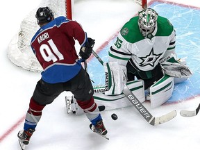 Anton Khudobin #35 of the Dallas Stars stops a shot from Nazem Kadri #91 of the Colorado Avalanche during the second period in Game 2 of the Western Conference Second Round during the 2020 NHL Stanley Cup Playoffs at Rogers Place on August 24, 2020.