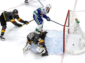 Elias Pettersson #40 of the Vancouver Canucks scores a goal past Robin Lehner #90 of the Vegas Golden Knights during the second period in Game 2 of the Western Conference Second Round during the 2020 NHL Stanley Cup Playoffs at Rogers Place on August 25, 2020.