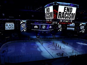 A moment of silence is held in light of the recent events in Kenosha, Wis.,, in regards to the shooting of Jacob Blake, prior to Game 3 of the Eastern Conference Second Round between the Boston Bruins and the Tampa Bay Lightning during the 2020 NHL Stanley Cup Playoffs at Scotiabank Arena on August 26, 2020 in Toronto, Ontario.