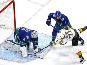 Jacob Markstrom #25 of the Vancouver Canucks stops a shot against William Karlsson #71 of the Vegas Golden Knights during the second period in Game 4 of the Western Conference Second Round during the 2020 NHL Stanley Cup Playoffs at Rogers Place on August 30, 2020.