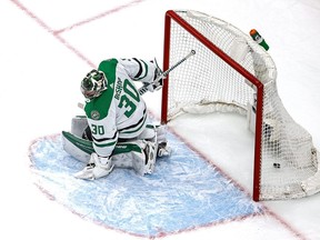 Ben Bishop #30 of the Dallas Stars allows a goal to Nathan MacKinnon (not pictured) of the Colorado Avalanche during the first period in Game 5 of the Western Conference Second Round during the 2020 NHL Stanley Cup Playoffs at Rogers Place on August 31, 2020.