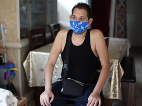 Francisco Garcia, 31, who spent almost four months in hospital with coronavirus disease, recovers at his home in Los Angeles, Calif., Aug. 19, 2020.