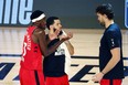 From left, Raptors' Pascal Siakam, Fred VanVleet and Marc Gasol talk during a game last week.