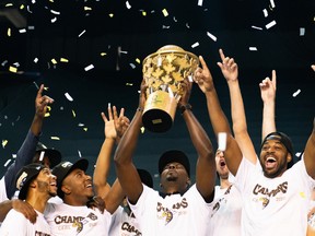 Edmonton Stingers head coach Jermaine Small lifts the Canadian Elite Basketball League championship trophy following a 90-73 win over the Fraser Valley Bandits in the Summer Series final at Meridian Centre in St. Catharines, Ont., on Sunday, Aug. 9, 2020.