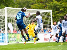 Halifax Wanderers FC midfielder Andre Rampersad (18) tries to head the ball into the goal from a corner kick against FC Edmonton in this file photo from Sept. 2, 2019.
