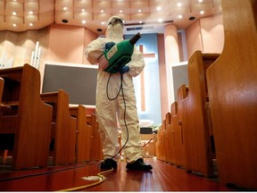 A member of a disinfection company sanitises the Yoido Full Gospel Church, which is the largest church in the country, in Seoul, South Korea August 21, 2020.