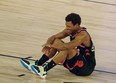 Toronto Raptors guard Kyle Lowry (7) sits on the court after Thursday's last-second win over Boston.