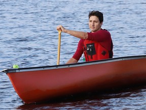 Justin Trudeau canoes around Lake Laurentian during a campaign stop at the Lake Laurentian Conservation Area in Sudbury, Ont., on Sept. 26, 2019.