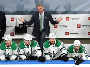 Head coach Rick Bowness of the Dallas Stars reacts to a penalty call in Game 5 of the Western Conference second round of the 2020 NHL Stanley Cup Playoffs at Rogers Place on Aug. 31, 2020.