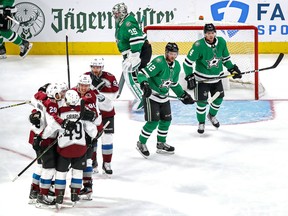 Cale Makar (No. 8) of the Colorado Avalanche is congratulated by his teammates after scoring a goal past Anton Khudobin of the Dallas Stars in Game Six of the Western Conference second round of the 2020 NHL Stanley Cup Playoffs at Rogers Place on Sept. 02, 2020.