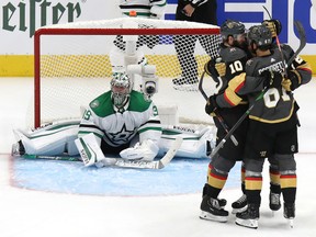 Paul Stastny (26) of the Vegas Golden Knights celebrates with Nicolas Roy (10) and Max Pacioretty (67) after scoring a goal on Anton Khudobin (35) of the Dallas Stars in Game 2 of the Western Conference final of the 2020 NHL Stanley Cup Playoffs at Rogers Place on Sept. 08, 2020.