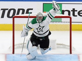 Anton Khudobin of the Dallas Stars celebrates an overtime series win against the Vegas Golden Knights in Game 5 of the Western Conference final of the the 2020 NHL Stanley Cup Playoffs at Rogers Place on Sept. 14, 2020.