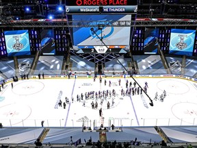 The New York Islanders and Tampa Bay Lightning shake hands after Game 6 of the Eastern Conference Final of the 2020 NHL Stanley Cup Playoffs at Rogers Place on Sept. 17, 2020.