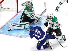 Anton Khudobin (35) of the Dallas Stars stops a shot by Alex Killorn (17) of the Tampa Bay Lightning in Game 1 of the 2020 NHL Stanley Cup Final at Rogers Place on Sept. 19, 2020.