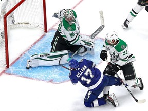 Anton Khudobin (35) of the Dallas Stars makes the save on a shot by Alex Killorn (17) of the Tampa Bay Lightning during the third period in Game 1 of the 2020 NHL Stanley Cup Final at Rogers Place on Saturday, Sept. 19, 2020.