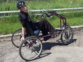 Ken Thomas rides his specialized $5,000 three-wheeled bike in the Edmonton river valley. The bike was stolen from a bike storage area in the parkade of the apartment building where he lives at 3 a.m. on Sept. 3, 2020.
