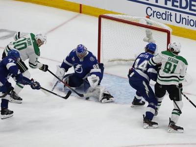 Dallas Stars goaltender Anton Khudobin (35) makes the save against the  Tampa Bay Lightning during the first period of Game 5 of the NHL hockey  Stanley Cup Final, Saturday, Sept. 26, 2020