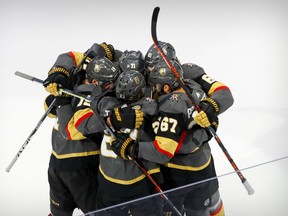 The Vegas Golden Knights  celebrate Shea Theodore scoring the game-winning goal against the Vancouver Canucks during the third period in game seven of the second round of the 2020 Stanley Cup Playoffs at Rogers Place on Friday Sept. 4, 2020.
