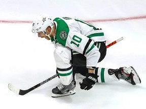 Corey Perry (10) of the Dallas Stars celebrates after scoring the game-winning goal against the Tampa Bay Lightning during the second overtime period to give the Stars the 3-2 victory in Game Five of the 2020 NHL Stanley Cup Final at Rogers Place on September 26, 2020.