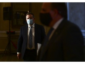 Alberta Premier Jason Kenney, left, and Quebec Premier Francois Legault leave a press conference in Ottawa on Friday, Sept. 18, 2020.